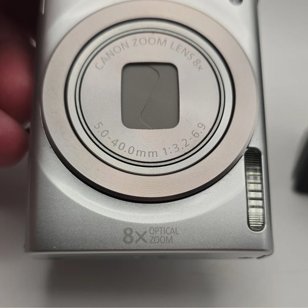 Canon PowerShot ELPH 180 20MP 8x Optical Zoom Silver Camera w Battery & Charger